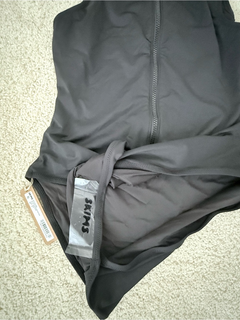 SKIMS Sleeveless Black Zip-Front Swimsuit in Color Onyx - Picture 7 of 11